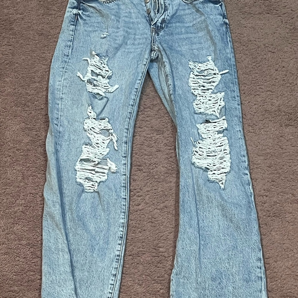 Distressed Light Blue Jeans